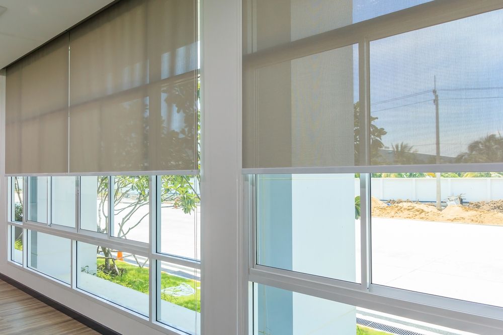 Roll Blinds on the windows, the sun does not penetrate the house. Window in the Interior Roller Blinds